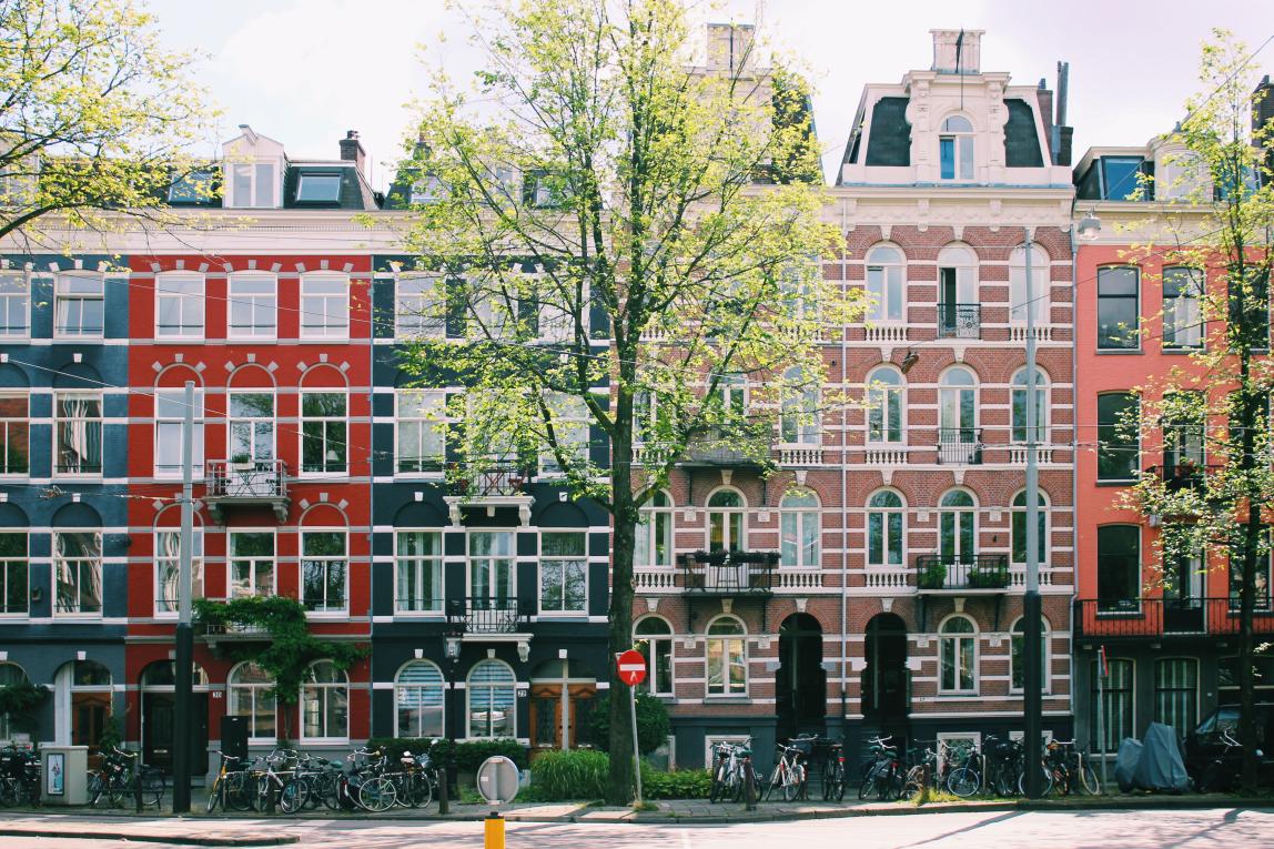 Classic Amsterdam buildings lining a street