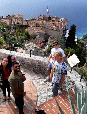 A top-down photograph of students on a balcony along the Coeur Riviera.