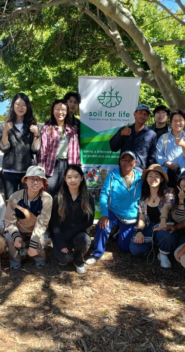 Group photo of SAF students at Soil for Life in Cape Town