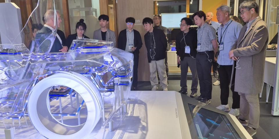 A group of Korean semiconductor professionals tour a facility in the Netherlands